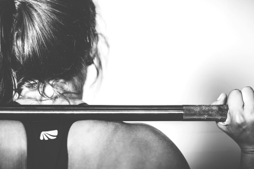 Woman exercising with weights